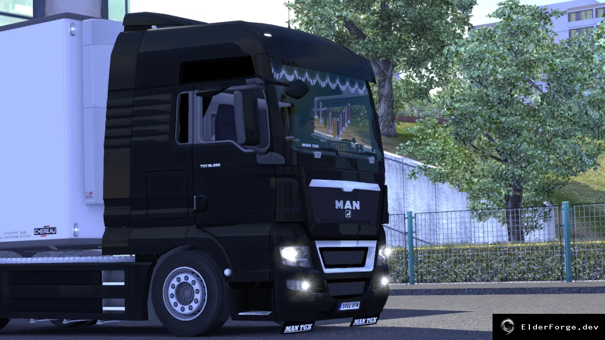 Обложка мода: Euro Truck Simulator 2 – Уютные аксессуары и тюнинг кабины для MAN TGX